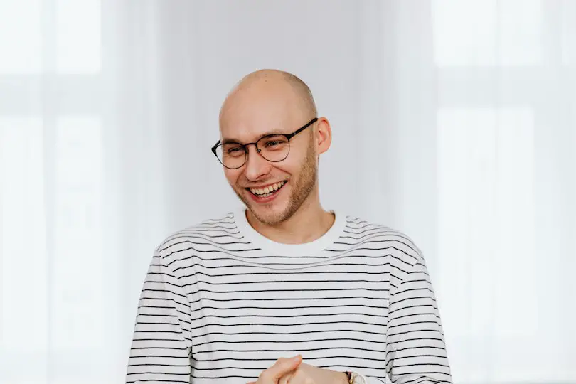 Man with Black Framed Eyeglasses Smiling